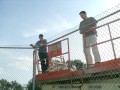 10-23-2004 Jimmy & Barry helping put chain link on the backstop  * 2592 x 1944 * (996KB)